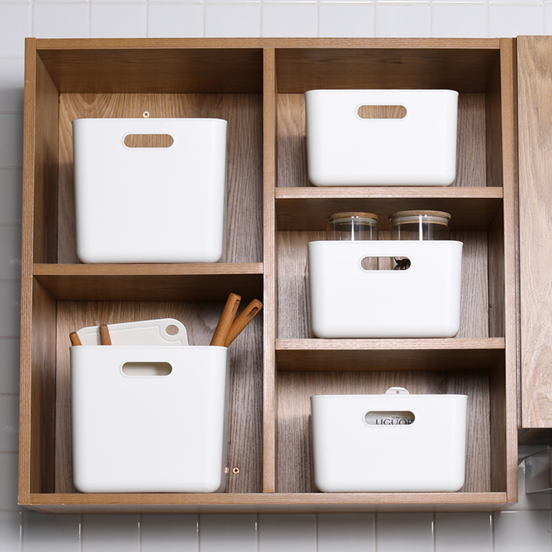Kitchen shelf with white plastic storage bins for pantry organization