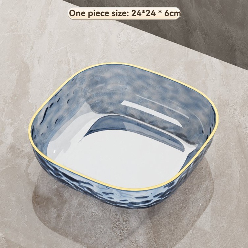 Detailed view of the tactile water ripple texture and golden rim on the commercial square fruit tray